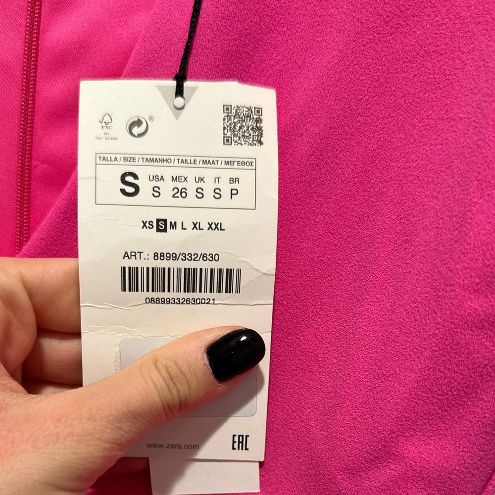 Fuchsia pink body suit from Zara.